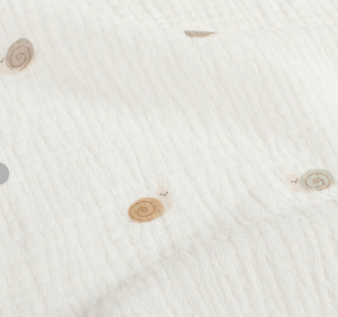 Stoff Musselin Schnecken weiss