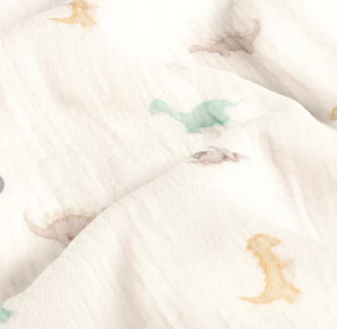 Stoff Musselin Dinos weiss